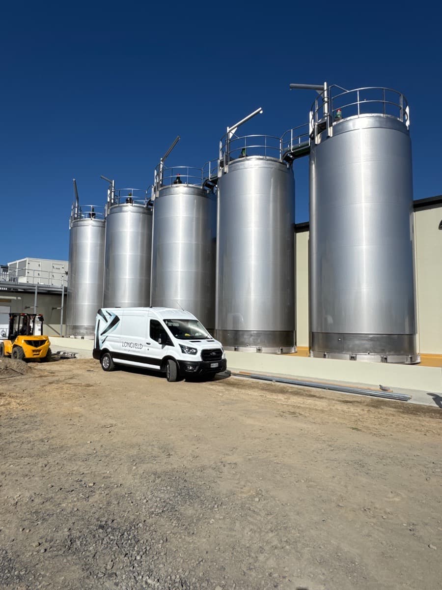 Geofix resin void fill injection into stainless steel silo base — Pukekohe Auckland
