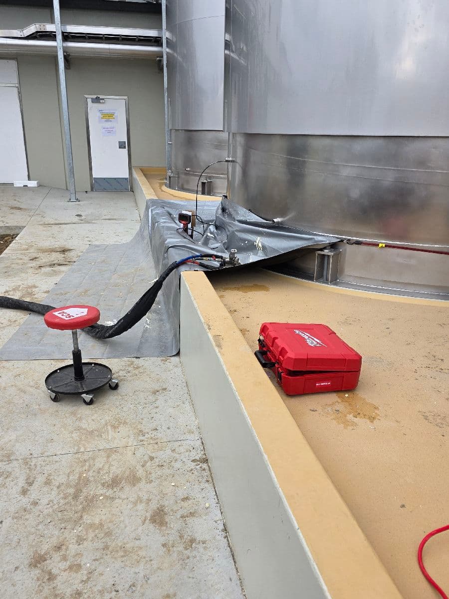 Geofix resin void fill injection into stainless steel silo base — Pukekohe Auckland